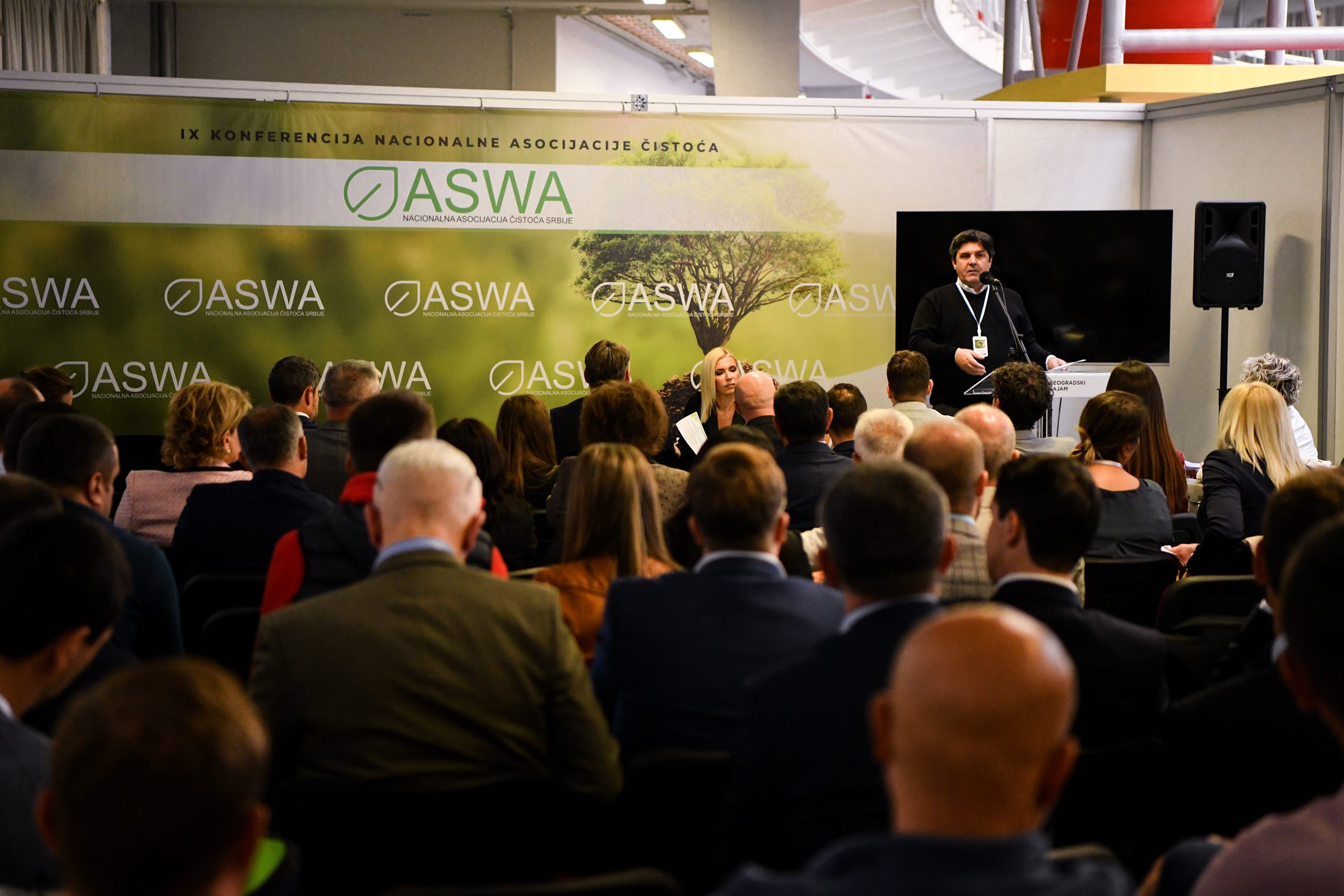 Speaker and full hall at an ASWA conference